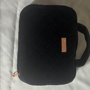 Skinbetter cosmetic bag with 2 products